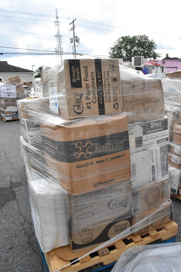 Pallet with 35 scratch and dent items including towel rolls, paper plates, cold cups, trash bags, and food trays, wrapped in plastic.