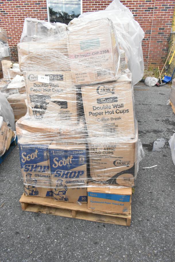 Pallet of assorted items including Scot Shop towels, Choice hot cups, and Lavex paper towel rolls, new and wrapped in plastic.