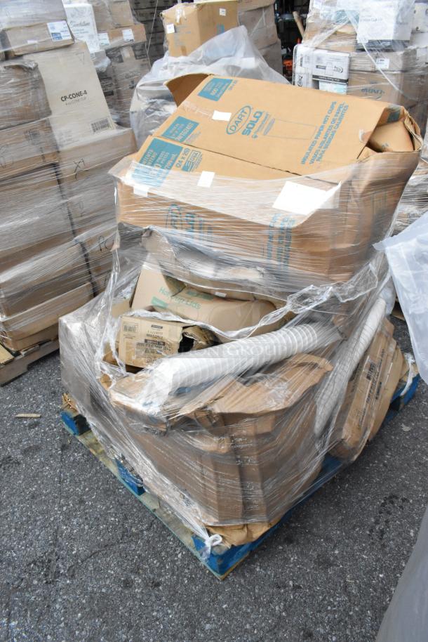 Pallet of 13 brand new scratch and dent items, including table bases and plates, wrapped in plastic. Boxes labeled "DART SOLO."