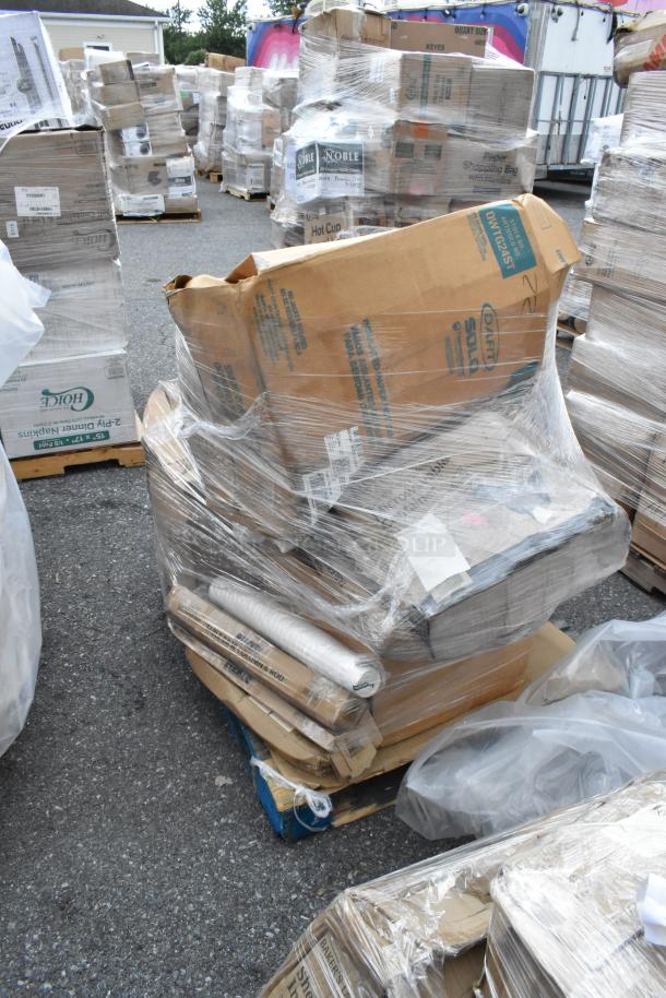 Plastic-wrapped pallet with various boxes marked "Noble" and others, showing scratch and dent condition. Contains table bases and plates.