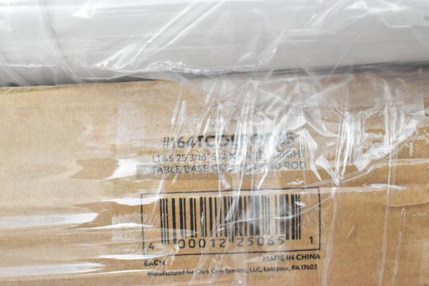 Cardboard box labeled "#164 TC016STD25," contains table base components, Clark Core Services, Made in China. Wrapped in plastic.