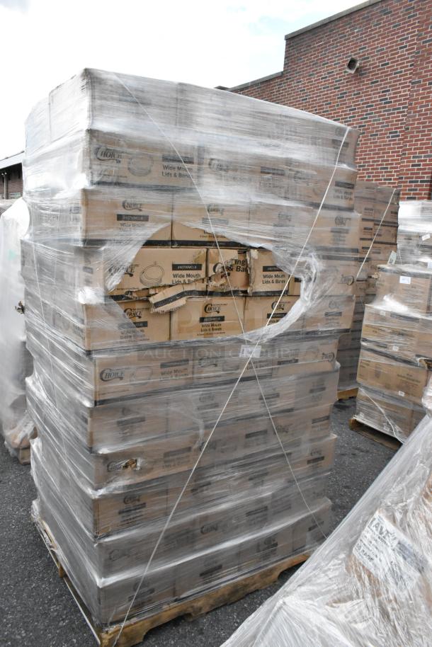 116 boxes of Choice Wide Mouth Lid and Bands for canning jars, wrapped and stacked, some boxes scratched. 48 packs per box.