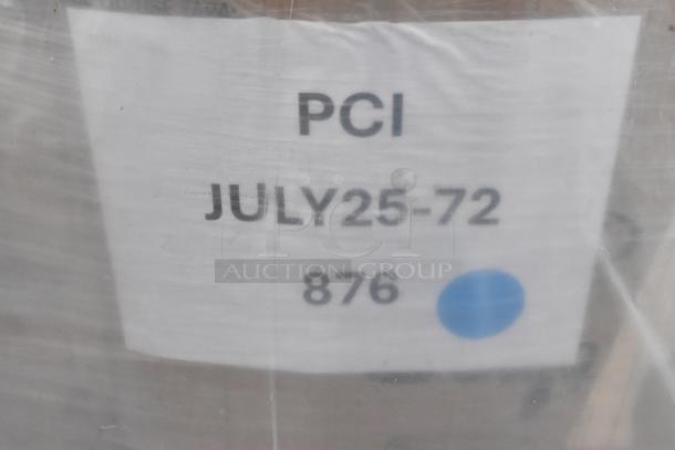 Label on pallet of scratch and dent items, includes details "PCI JULY25-72 876"; plastic wrap visible.