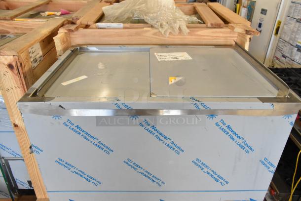 Brand new 2022 BKI 52473-1 stainless steel commercial meat freezer on casters, 115V, 1 phase, with protective film.