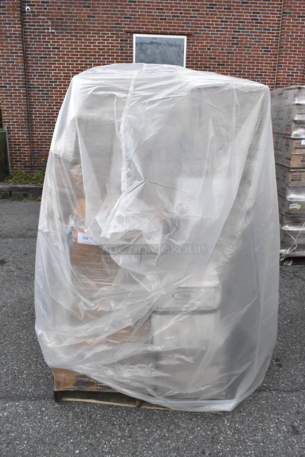 Plastic-wrapped pallet containing 30 new scratch and dent items including napkins, plates, hot cups, containers, and trash bags.