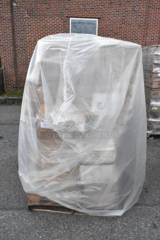 Plastic-wrapped pallet containing 30 new scratch and dent items including napkins, plates, hot cups, containers, and trash bags.