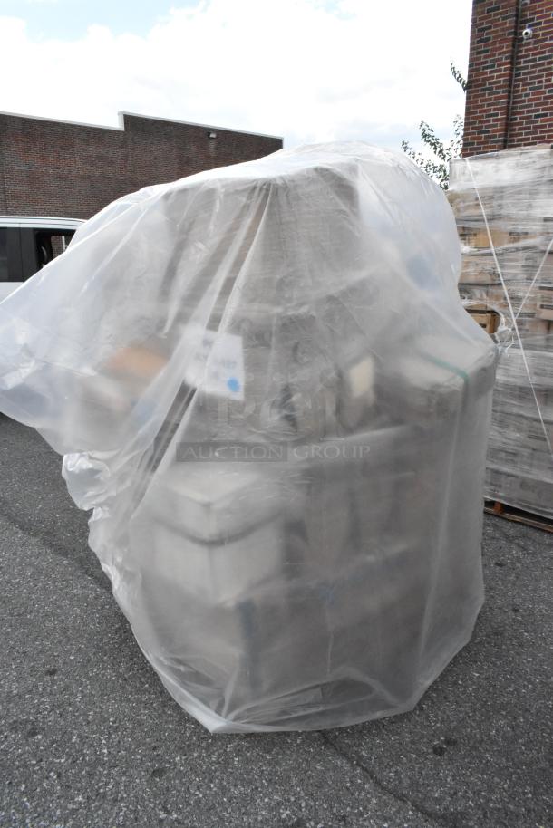 Plastic-covered pallet of 30 assorted scratch and dent items including napkins, plates, cups, and containers, brand new.