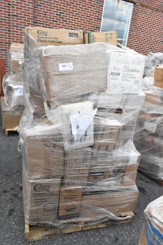Pallet of 37 scratch and dent items, stacked boxes of serving bowls, lids, toilet paper, and foam cups, wrapped in plastic.