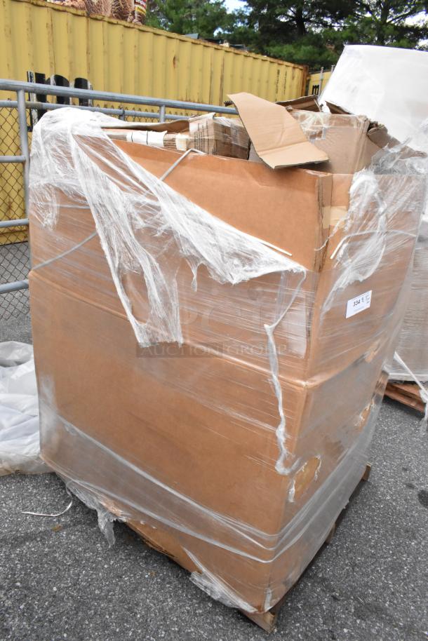 Large pallet wrapped in plastic containing 20 brand new scratch and dent items, including stanchion and shelves. Signs of exterior wear.