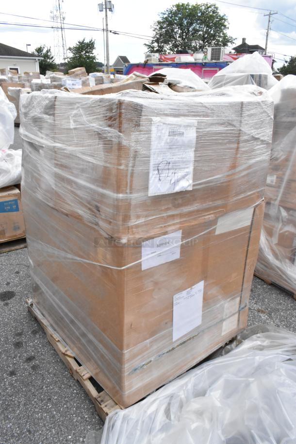 Pallet with 20 brand new scratch and dent items wrapped in plastic. Labels show shipping and inventory details.