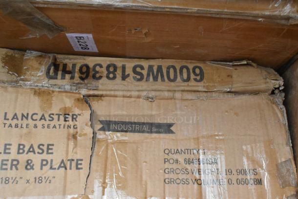 Cardboard box labeled "Lancaster Table & Seating Industrial Series" with visible wear and water damage.