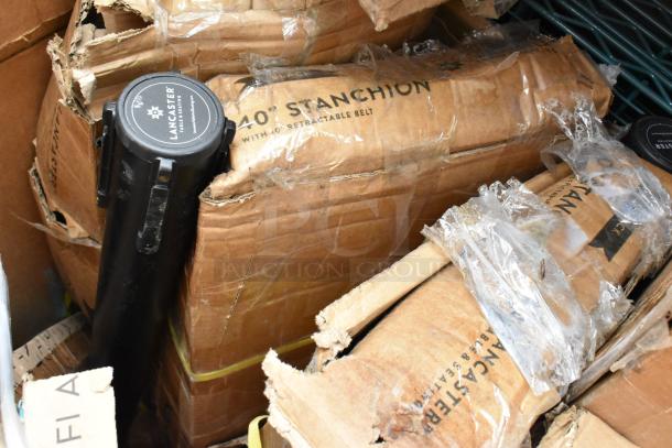 20 brand new scratch and dent items. Visible: Lancaster stanchion with retractable belt in damaged packaging.