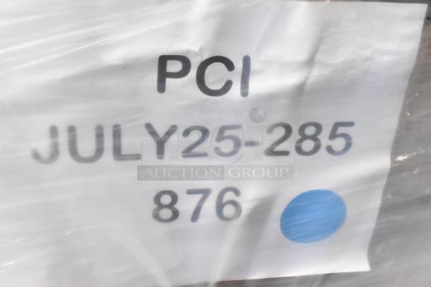 Plastic-wrapped label on auction items, marked "PCI JULY25-285 876," with a blue dot indicator.