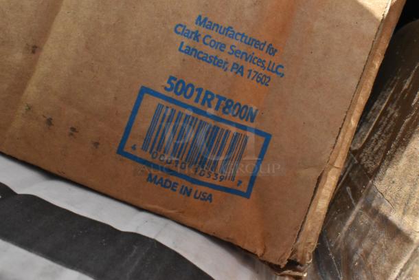 Cardboard box with blue text: "Manufactured for Clark Core Services, LLC, Lancaster, PA 17602." Barcode: 5001RT800N, "Made in USA."