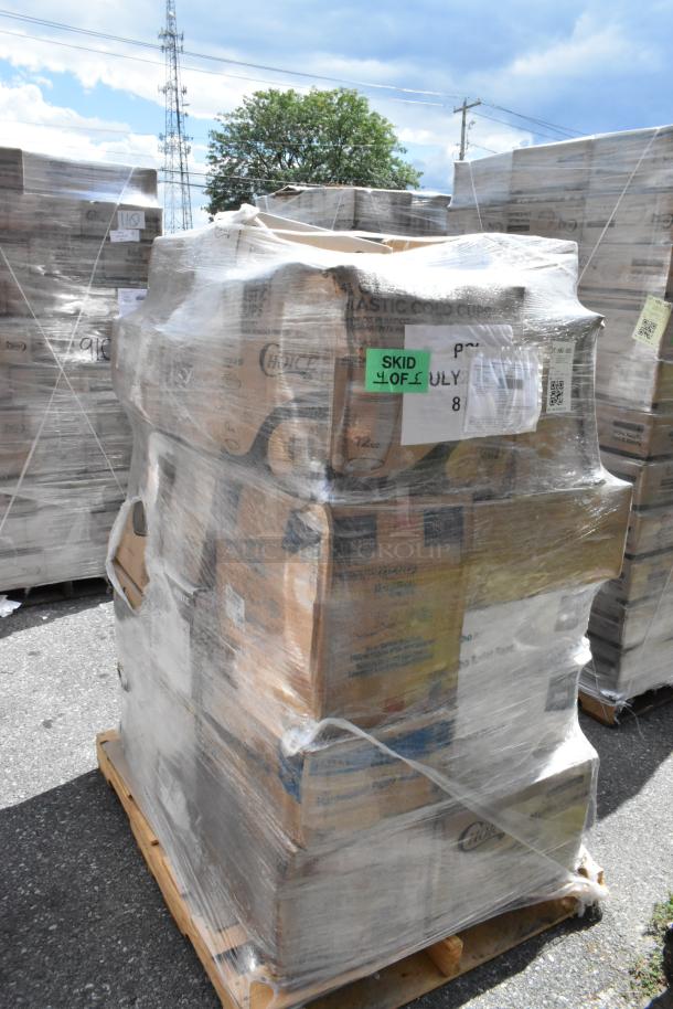 Pallet of 30 brand new scratch and dent items wrapped in plastic; visible boxes and labels with cutlery and toilet paper.