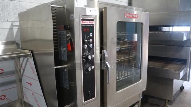 MARKET FORGE MFC-101 S/AA electric combi steamer, stainless steel, commercial use, visible control panel, excellent condition.