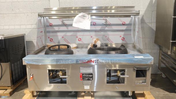 BRAND NEW Town Y-2-SS-N York™ two-chamber natural gas wok range, stainless steel, protective wrapping, labels visible.