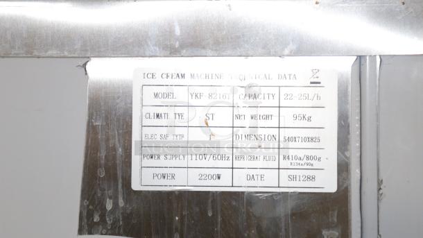 VEVOR Commercial Soft Ice Cream Machine model YKF-8216T label showing specs: 22-25L/h capacity, 95kg, 2200W power.