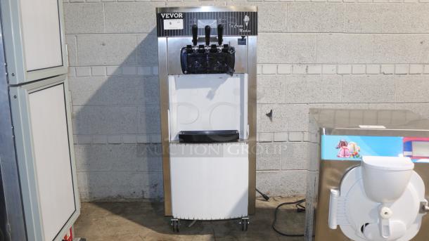 VEVOR YKF-8228H commercial soft ice cream machine, 2200W, 3 flavors, 5.3-7.4 gallons/hour, stainless steel, good condition.
