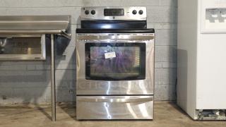 Kenmore stove model C648433, stainless steel, used condition, front controls, visible label with number 13.