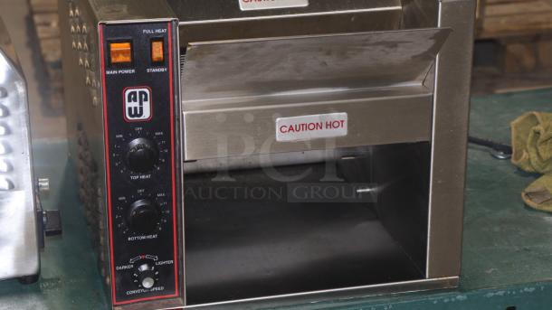 Wyott AT-10 Conveyor Toaster, used in excellent condition, 208/240V, features heat controls, caution hot label, tested and working.