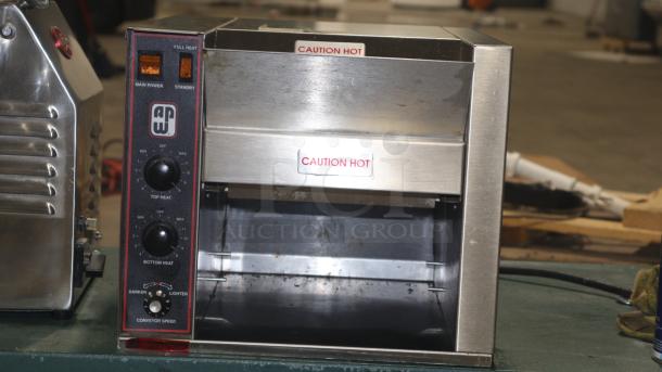 Wyott AT-10 Conveyor Toaster, stainless steel, excellent used condition, 208/240V, caution hot labels visible.