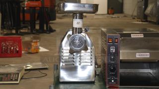 NEW Meat Grinder with Reverse Function - 110V, 1 1/2 hp This unit can process up to 540 lb. of meat per hour - Item #1202251