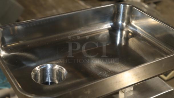 NEW AVANTCO Meat Grinder Model 177MG22R, stainless steel tray, 1 1/2 hp, 540 lb./hour capacity, reverse function.