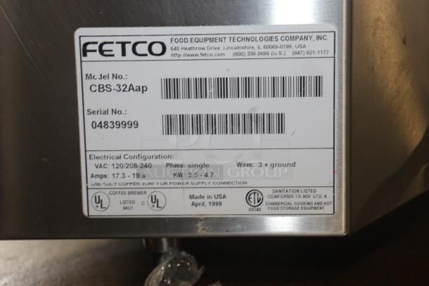 Used Fetco CBS-32Aap stainless dual coffee brewer machine, 120/208-240V, model and serial labels visible, good condition.
