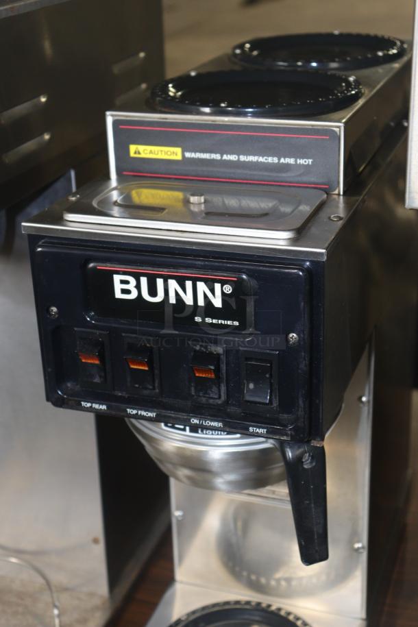BUNN VP17 coffee maker, black with control panel and warning label. Good condition, dual warming plates.