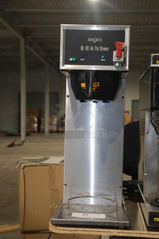 Brewmatic M-90 Air Pot Brewer, stainless steel, features start and ready indicators, appears in good condition.
