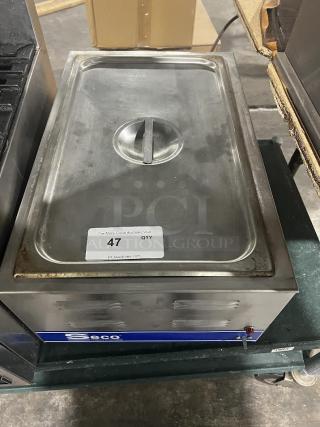 SESCO CW-1200 stainless steel warmer. Slightly worn with label showing "47 QTY" from PCI Auctions.