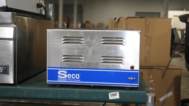 SESCO CW-1200 food warmer, stainless steel, blue label, vented design, good condition, red indicator light.