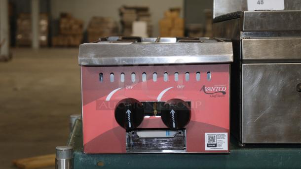 Avantco Chef Series CAG-R-2-12, 2 burner cooktop, in good condition, with visible control knobs and branding.