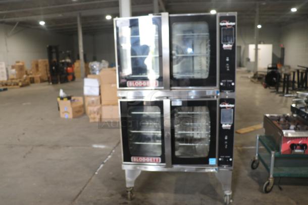 Blodgett HVH-100E double stack convection oven in industrial setting, stainless steel, glass doors, on castor wheels.