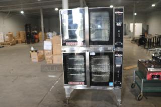 Blodgett HVH-100E double stack convection oven in industrial setting, stainless steel, glass doors, on castor wheels.
