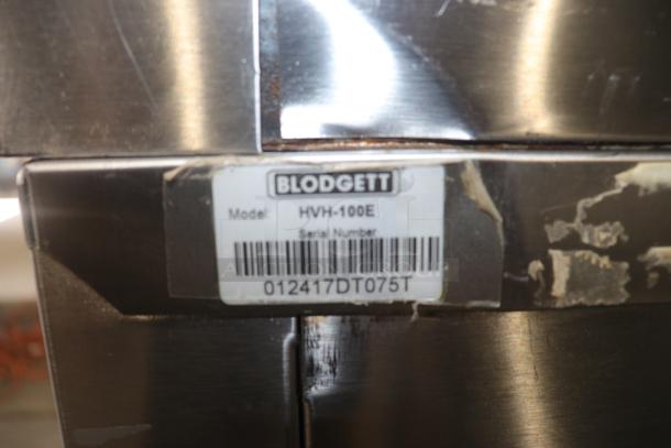Blodgett HVH-100E oven label showing model and serial number, minor surface wear.