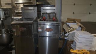 Avantco FF50 natural gas fryer, dual baskets, stainless steel, model 177FF50N, used condition, visible brand logo and warning label.