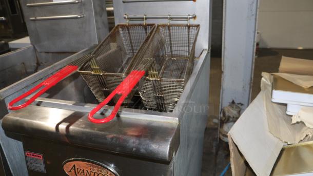 Avantco FF50 Natural Gas Fryer with twin baskets and red handles, model 177FF50N, visible warning label, stainless steel body.