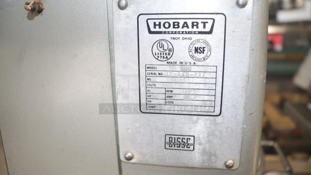 Hobart D300 30 Qt dough mixer tag showing model details, UL and NSF certified, 115 volts, made in USA.