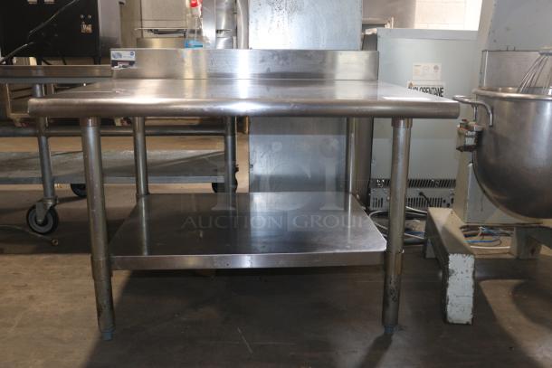 Brand new stainless-steel commercial table with undershelf. Durable, high-quality finish, ideal for kitchen use.
