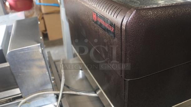 Grindmaster-Cecilware ESP2-220V Venezia II espresso machine in good condition, featuring Grindmaster branding.