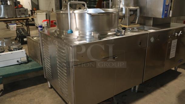 Cleveland 60 Gallon Tilt Kettle & Gas Steam Generator, Model X4PS, stainless steel, used condition.