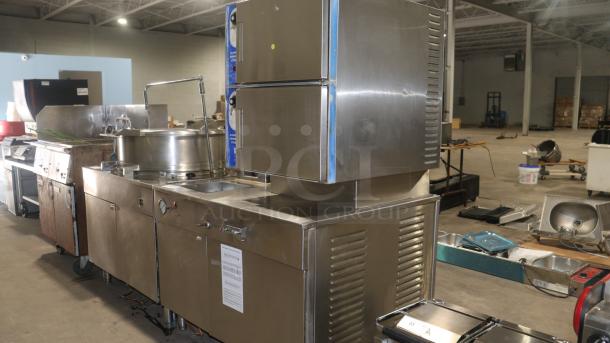 Cleveland x2d0tle convection stemmer, stainless steel, dual compartments, good condition, industrial setting visible.