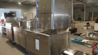 Cleveland x2d0tle convection stemmer, stainless steel, dual compartments, good condition, industrial setting visible.