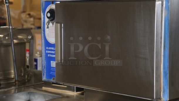 Cleveland convection steamer model x2d0tle with stainless steel exterior. Visible control panel and door in working condition.