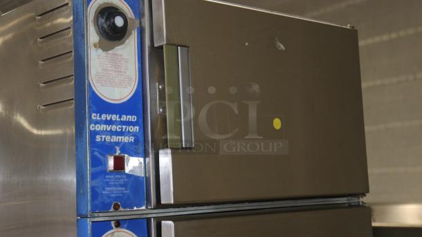 Cleveland x2d0tle convection steamer, stainless steel, used condition, visible control panel, instructional labels intact.