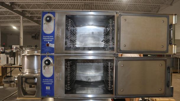 Cleveland x2d0tle convection steamer, double unit, stainless steel, open door view, good condition. Model tags visible.