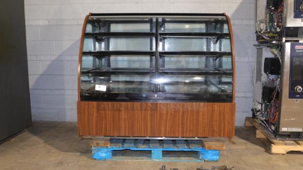 Structural Concepts H5C5650LR display case, curved glass, refrigerated/non-refrigerating, self-contained, 120v, wood finish.
