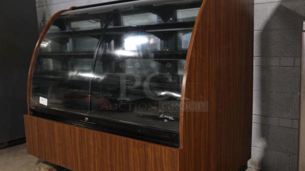 Structural Concepts H5C5650LR display case, refrigerated/non-refrigerating, curved glass, wood finish, 120v, self-contained.
